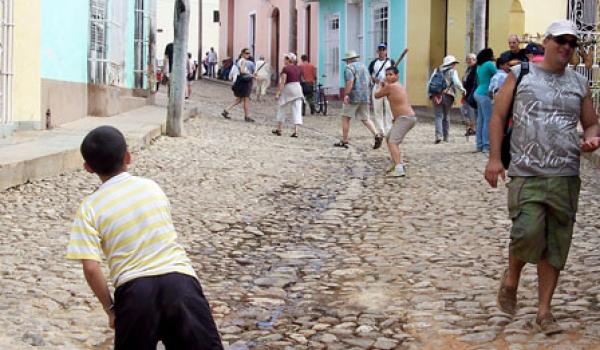 Street ball erupts with no warning in the streets of Trinidad, Cuba. Photos: Keck