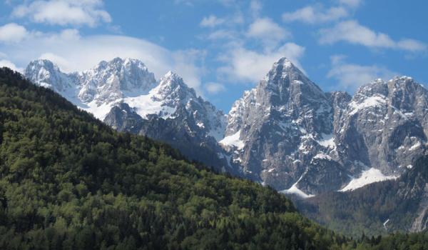 The road leading toward Mt. Vršič Pass offers dramatic alpine scenery.