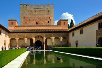 Book reserved-time tickets online as far ahead as possible for Granada’s Alhambra to ensure that you’ll see its best part — the exquisite Palacios Nazaries. Photo by Cameron Hewitt