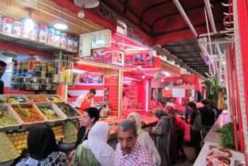 People shopping for food in Meknes' medina a few days before the start of Ramadan. Photo by Stephen Addison