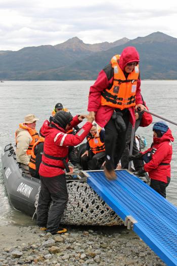 Ray Bahde stepping off the Zodiac in Ainsworth Bay, Chile. Photo by Wanda Bahde