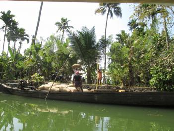 Workers seen on a cruise near Kumarakom. Photo by Richard Felak