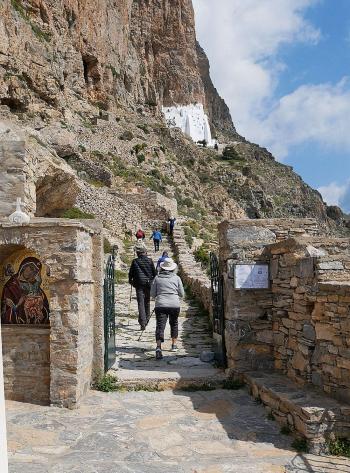 Climbing the “donkey steps” that lead to a monastery on Paros.