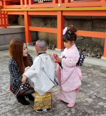 Children in traditional dress preparing for a ceremony at one of the shrines we visited.