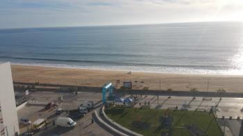 The expansive beach-and-sea view from our apartment balcony in Quarteira — the Algarve, Portugal.