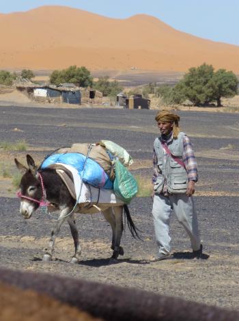 A nomad returning to his mobile tented camp near Merzouga, in Morocco's Sahara. Photo by Randy Keck