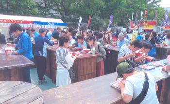 People sampling various types of ramen at the Sapporo Ramen Show. Photo by Stanley Osur