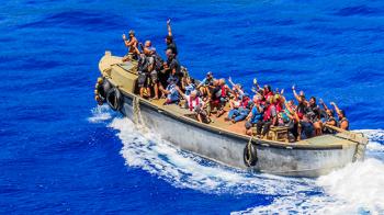 Pitcairn Islanders make much of their income from what they sell to cruise ship passengers — jewelry, wooden items, honey, postcards, stamps, etc. Here they are returning home after a very successful visit to our ship (February 2020).