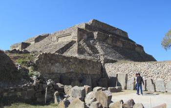 Danzantes, with Building M in the background — Monte Albán, southern Mexico. Photos by Julie Skurdenis