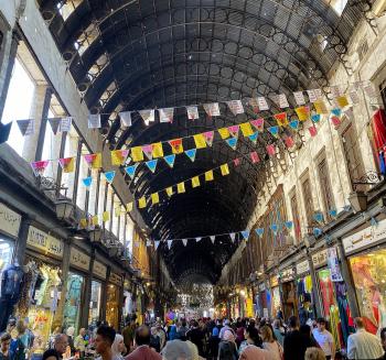 Strolling through the Souk Al-Hamidiyah.