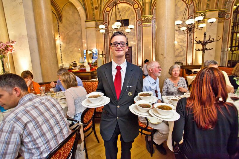 In Vienna, the neighborhood coffeehouse down the street doubles as the locals’ “living room.” Photo by Dominic Arizona Bonuccelli